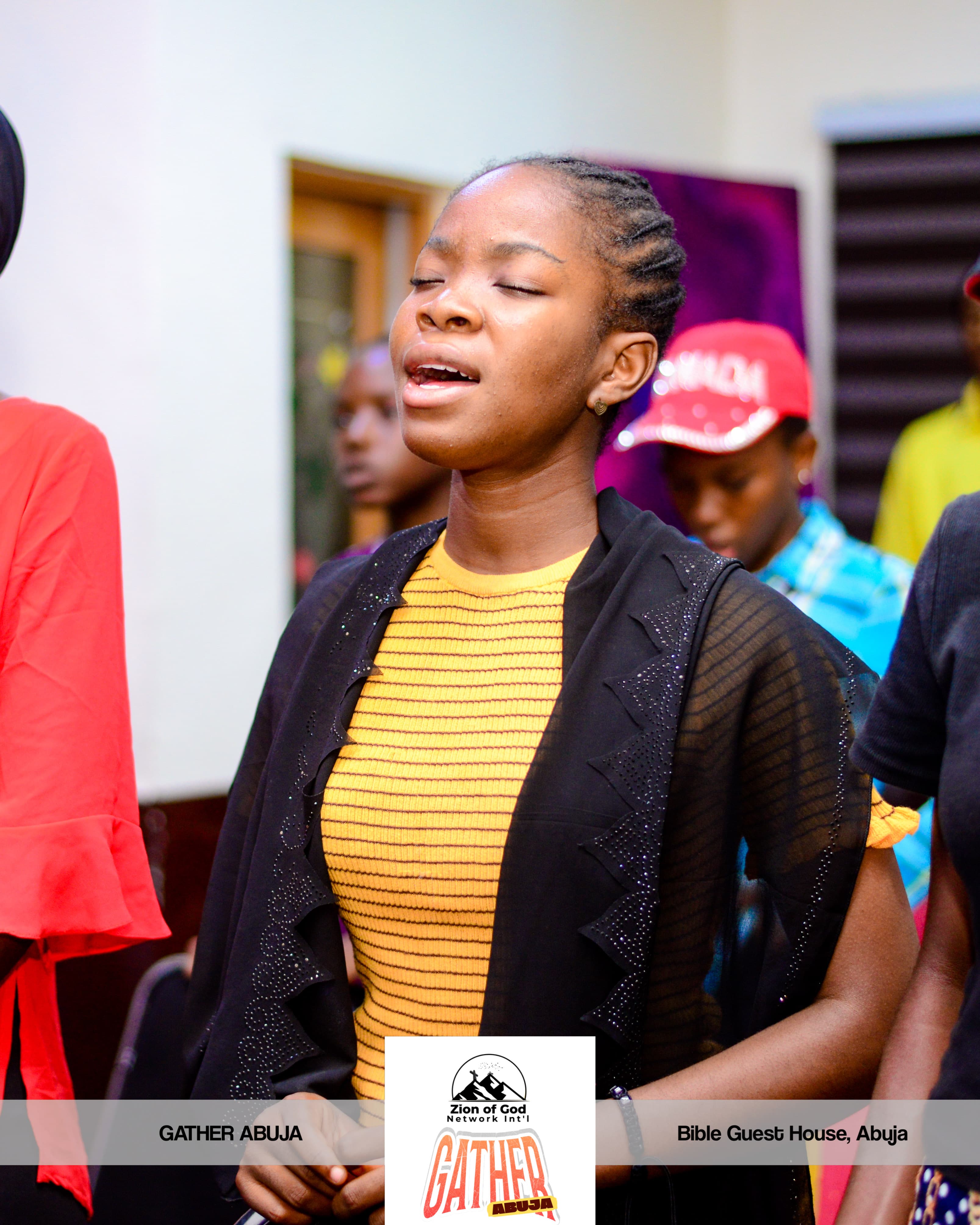 Devout woman praying in worship